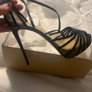 Brand new Christian Louboutin shoes.  In original box.
